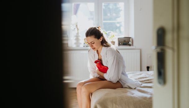 Woman,At,Home,Suffering,From,Menstrual,Pain,,Having,Cramps.,Woman